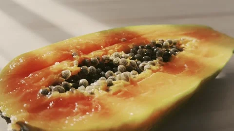 Close-up of a cut papaya Stock Footage 254609696