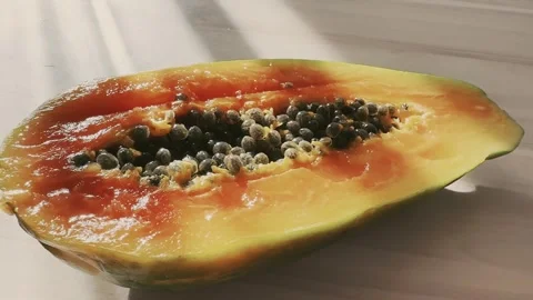 Close-up of a cut papaya Stock Footage 254612192