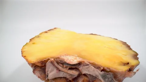 Close up of cut pineapple on white background Stock Footage 328428507