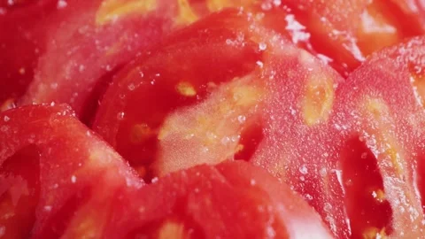Close up of cut red tomato. Texture of juicy red fresh tomato. Stock Footage 308539214