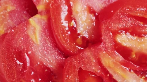 Close up of cut red tomato. Texture of juicy red fresh tomato. Stock Footage 315753158