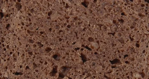 Close-up cut of rye bread. Vidéo 167583877