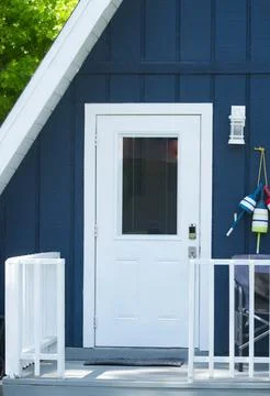 Close up of cute adorable A frame triangle shaped house or home with deep b.. Stock-Fotos