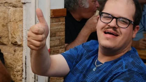 Close Up, A Cute Boy With Down Syndrome In Tel Aviv, Israel Video stock 90545239