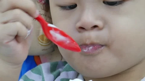 Close up cute boy eating ice cream and enjoy 스톡 동영상 56697623