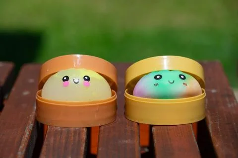 Close-up of cute dumpling squishy toys sitting in steamer boxes Stock Photos