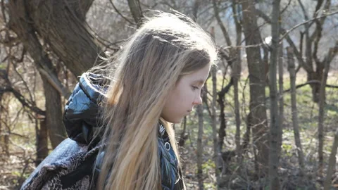 Close up of cute female child with backpack going along a trail near garden Stock-Footage 141502265