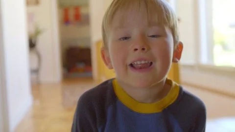 Close up of cute kid making faces Stock Footage 76546780