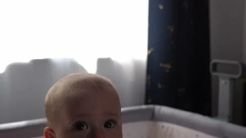 Close-up Cute Nake diaper Kid 10 Month Newborn Boy Looking At Camera crawling Vídeos de archivo 199102441