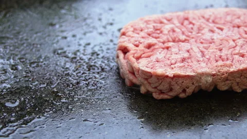 Close-up cutlet fried on a hot grill Stock Footage 88561037