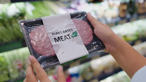 Close-up cutlet patty beyond meat zero, non-meat product in market. Stock Footage 167812214
