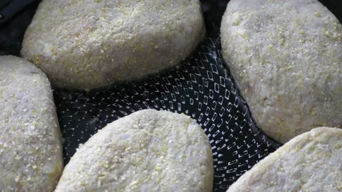 Close-up cutlets are fried in a pan Stock Footage 171279115
