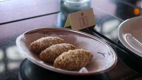 Close-up of cutlets lying on a plate In an elite restaurant. Stock Footage 154740599