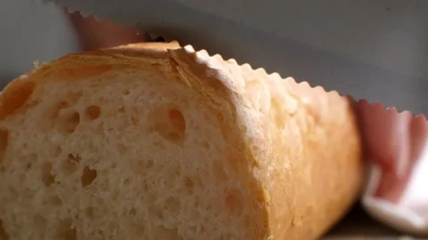 Close up of Cutting Bread Vídeos de archivo 88079944