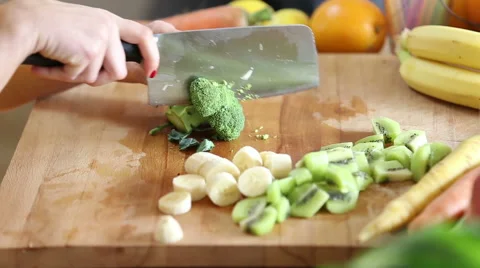Close-up of cutting broccoli with knife Stock Footage 59540805