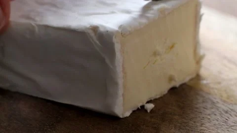 Close up of Cutting Cheese Brie Stock Footage 88082508