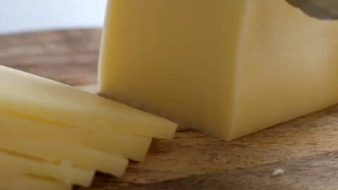 Close up of Cutting Cheese Stock Footage 88079341