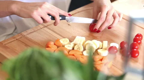 Close-up of cutting cherry tomatoes Stock Footage 59541509