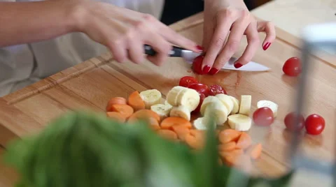 Close-up of cutting cherry tomatoes Stock Footage 59541512