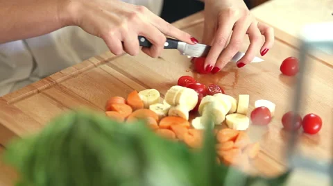 Close-up of cutting cherry tomatoes Stock Footage 59541517