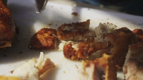 Close-up cutting a Chinese box pork ribs with a knife and hands into small Video stock 170020765