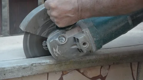Close up on cutting concrete block with circular machine Stock Footage 65227676