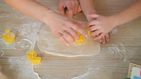 Close up of Cutting Easter Cookies from a Dough Stock Footage 147442378