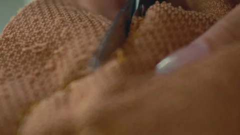 Close Up Of Cutting Fabric For DIY Bear At Build-A-Bear Workshop Stock Footage 298161715