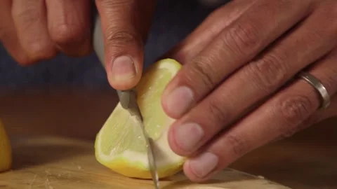 Close up of cutting fresh lemons Stock Footage 252030959