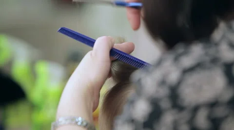 Close-up of cutting hair. Stock Footage 49390677