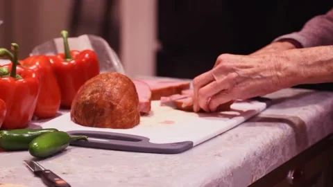 Close up cutting ham Stock Footage 135950474
