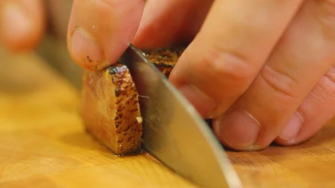 Close UP Cutting Meat in Pieces Vídeos de archivo 113283750