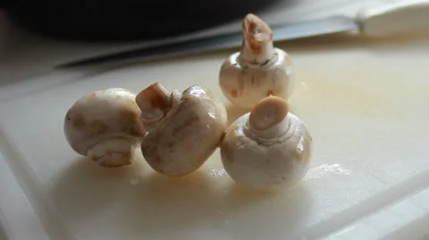 Close-up Cutting Mushrooms, High Def. Stock Footage 33771545