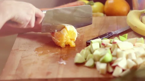 Close-up of cutting orange with knife Stock Footage 59540716