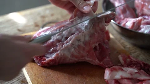 Close up of cutting rabbit carcass at home 4k Stock Footage 131037493