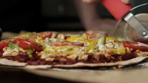 Close up of cutting roll cut through cheesy Pizza. Stock Footage 150378677