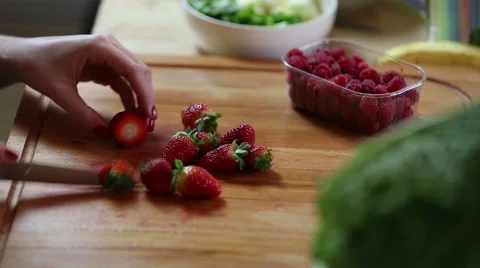 Close-up of cutting strawberries Stock Footage 59541650