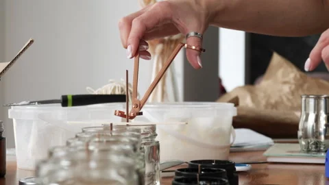 Close-up cutting the wick of a candle Video stock 240522876