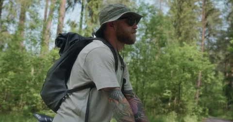 Close-up of cyclist lifting from handlebars, looking ahead Stock Footage 311934366