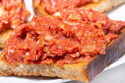 Close-up of Czech toasted bread with raw beef steak tartare. typically Czech Stock Photos