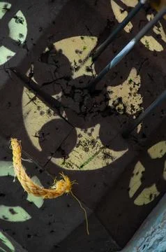 A close-up of a damaged archery target with arrows embedded in it Stock Photos