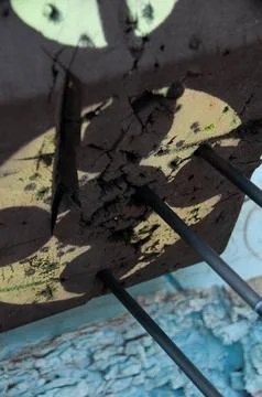 A close-up of a damaged archery target with arrows embedded in it Stock Photos