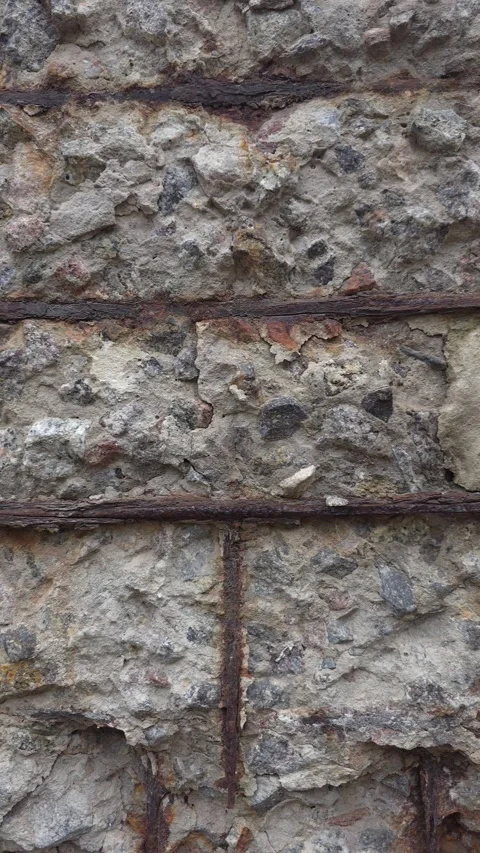 Close up of damaged concrete slab with exposed rusty rebar Stock Footage 345448412