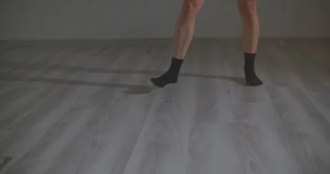 Close-up of dancer legs dancing and moving during choreography Stock Footage 229487763