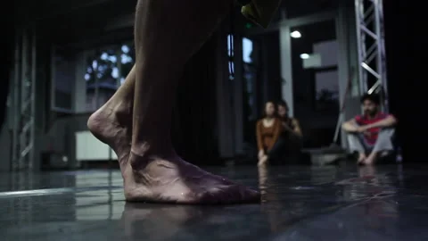 A close up of a dancer steps in slow motion Stock Footage 139876427