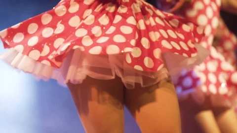 Close up dancers with mini red skirts with white dots, close up dancers Stock-Footage 120383174