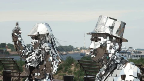 Close-up of dancers performing in a shiny disco robot costumes made of mirrors Stock Footage 119522526