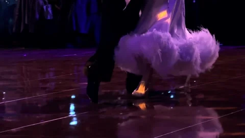 Close up of dancing feet moving in sync, symbolizing partnership, coordination Video stock 326215310