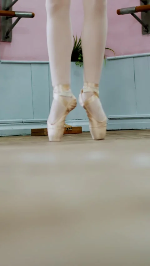 Close up, in dancing hall, ballerina performs pas courru , pointe , She is Stock Footage 313733133