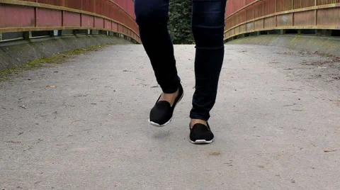 Close up of dancing woman's legs  on the bridge Vídeo Stock 66793257